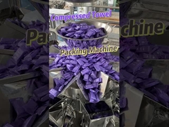 Eight-Station Compressed Towel Bag-Feeding Packaging Machine